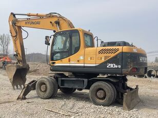 escavatore gommato Hyundai 210W-9